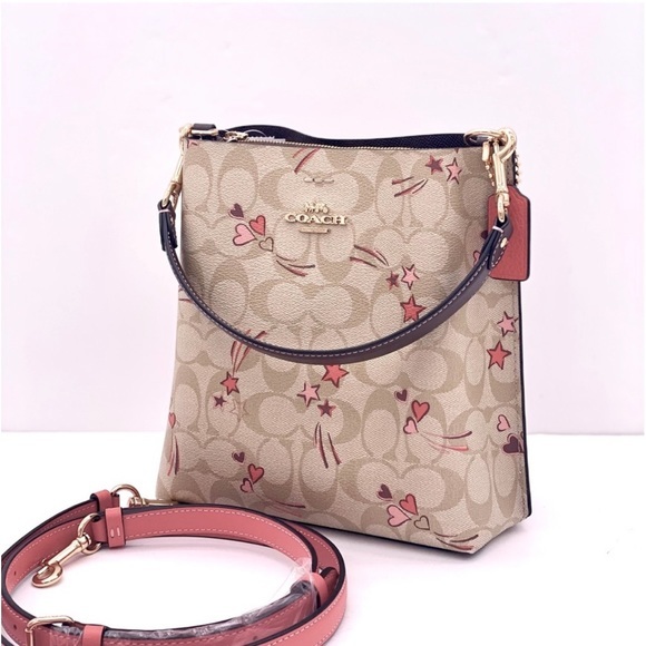 Coach Handbags - Coach Mollie Bucket Bag 22 In Signature Canvas With Heart And Star Print
